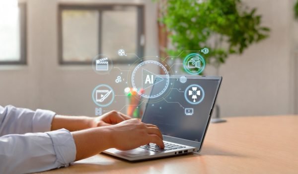 Marketer using AI tools to personalize digital ads and audience targeting
